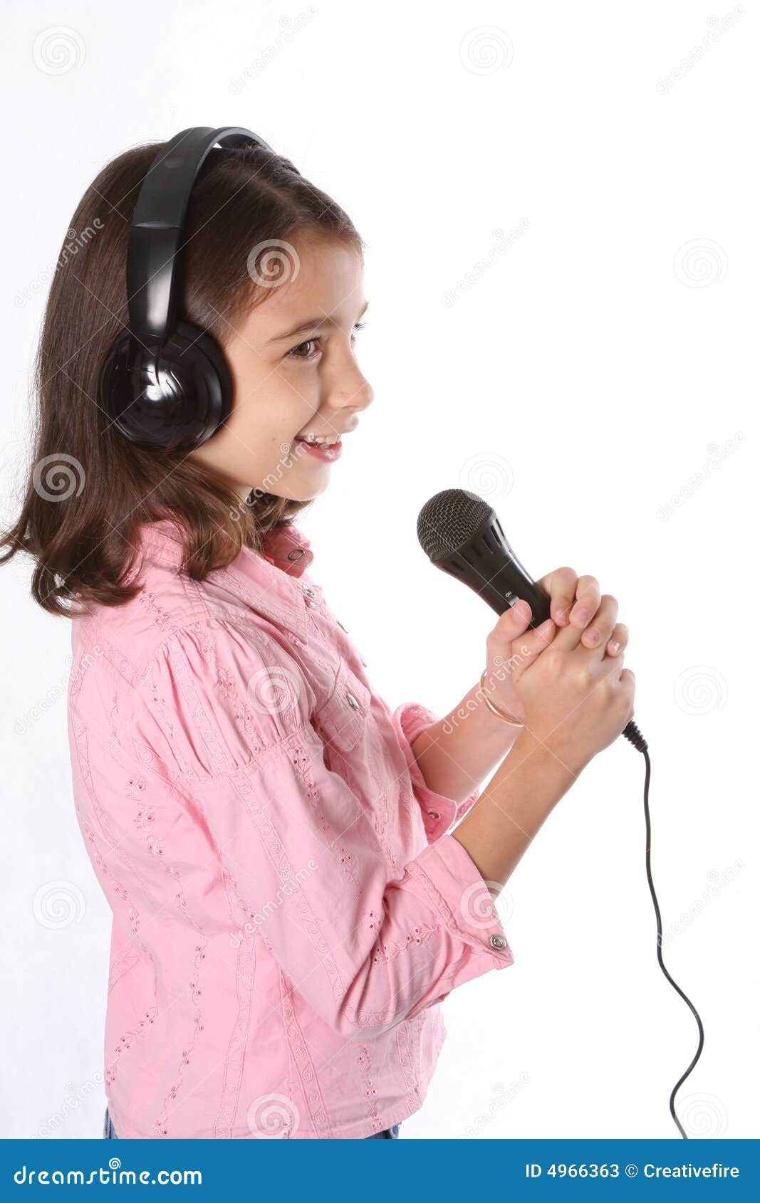 Young Girl / Child Singing with Microphone Stock Image Image of face
