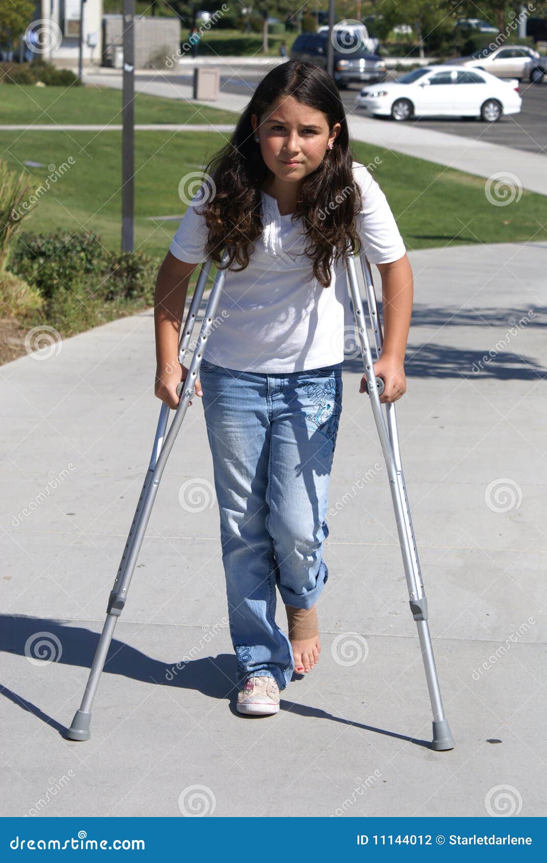 Young Girl With Crutches Stock Photography Image 11144012