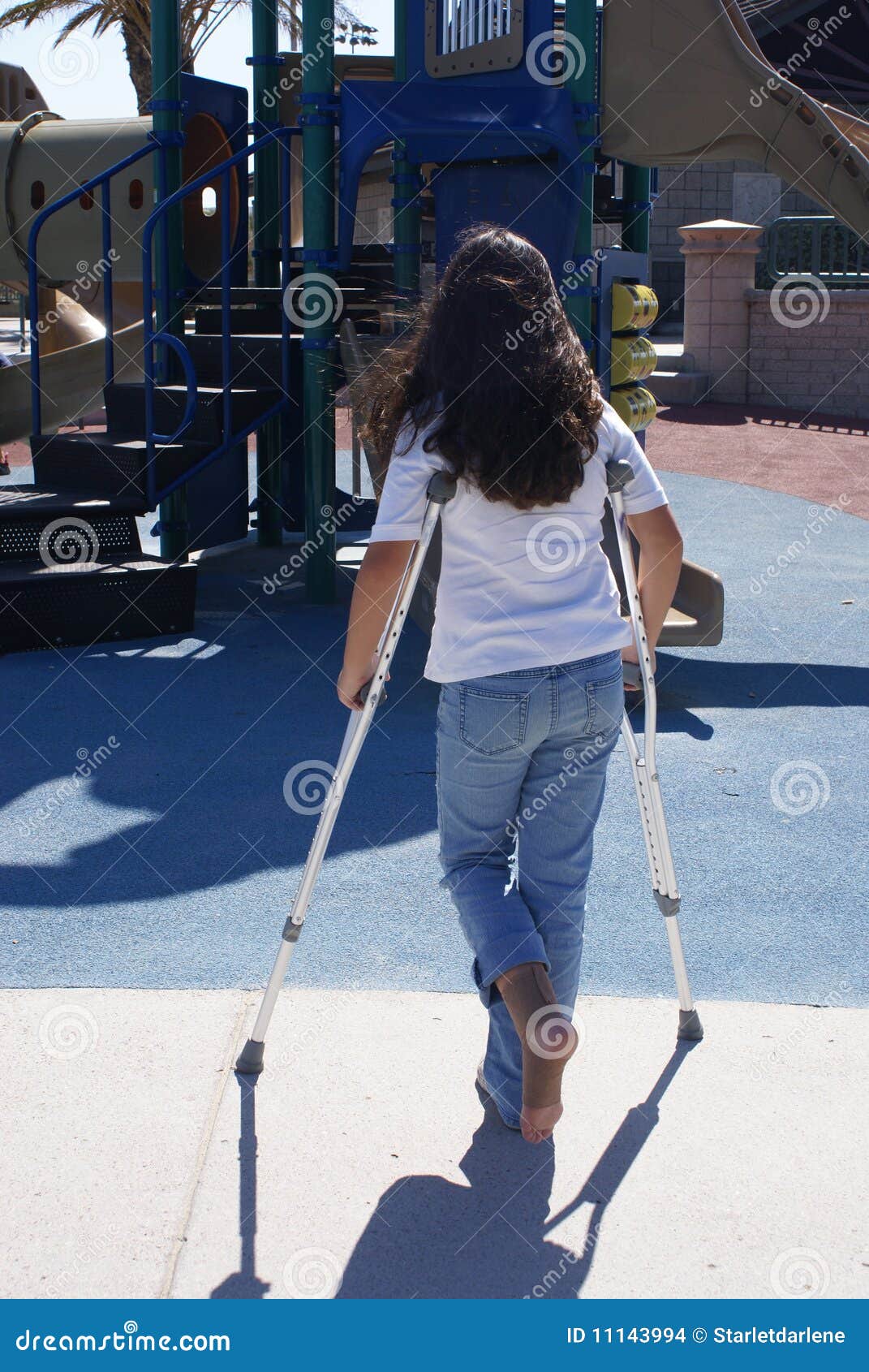 Young Girl With Crutches At Playground Stock Images 