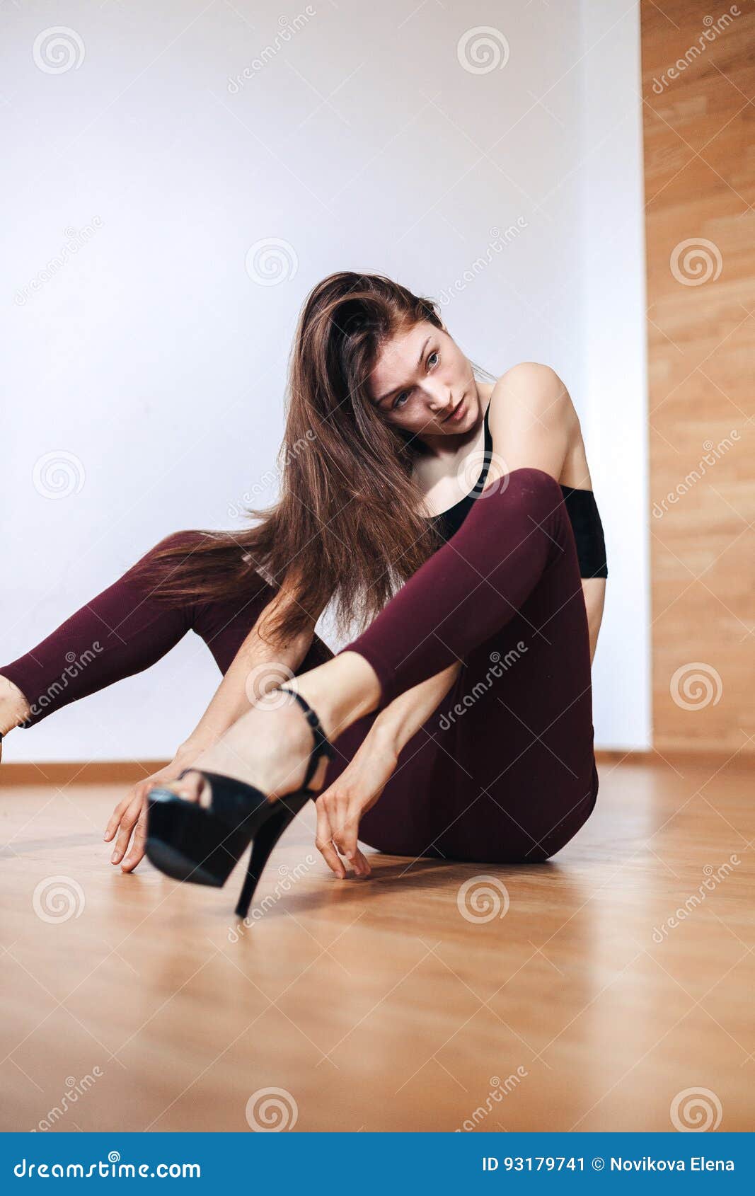 Self-expression. Attraction. Young woman in bodysuit and heels dancing,  performing over black background. Concept of contemporary dance style, art,  aesthetics, hobby, creative lifestyle Stock Photo | Adobe Stock