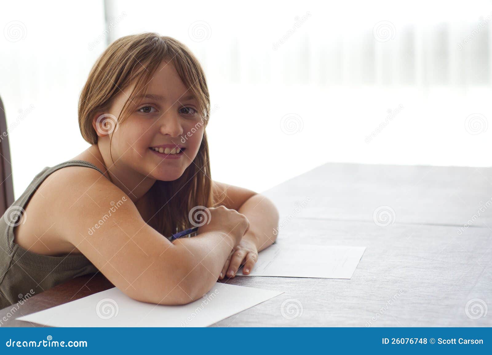 Young Girl Doing Homework at Kitchen Table Stock Photo Image of book