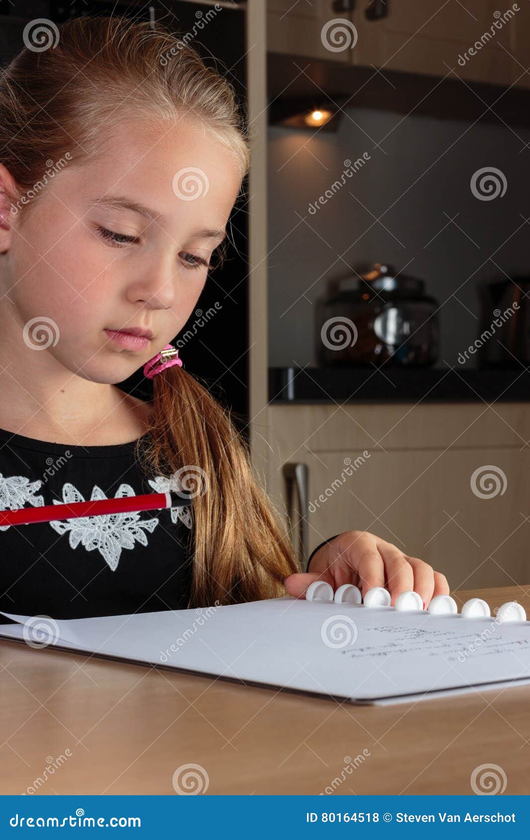 Young Girl Doing Homework at the Kitchen Table Stock Photo Image of children, home 80164518