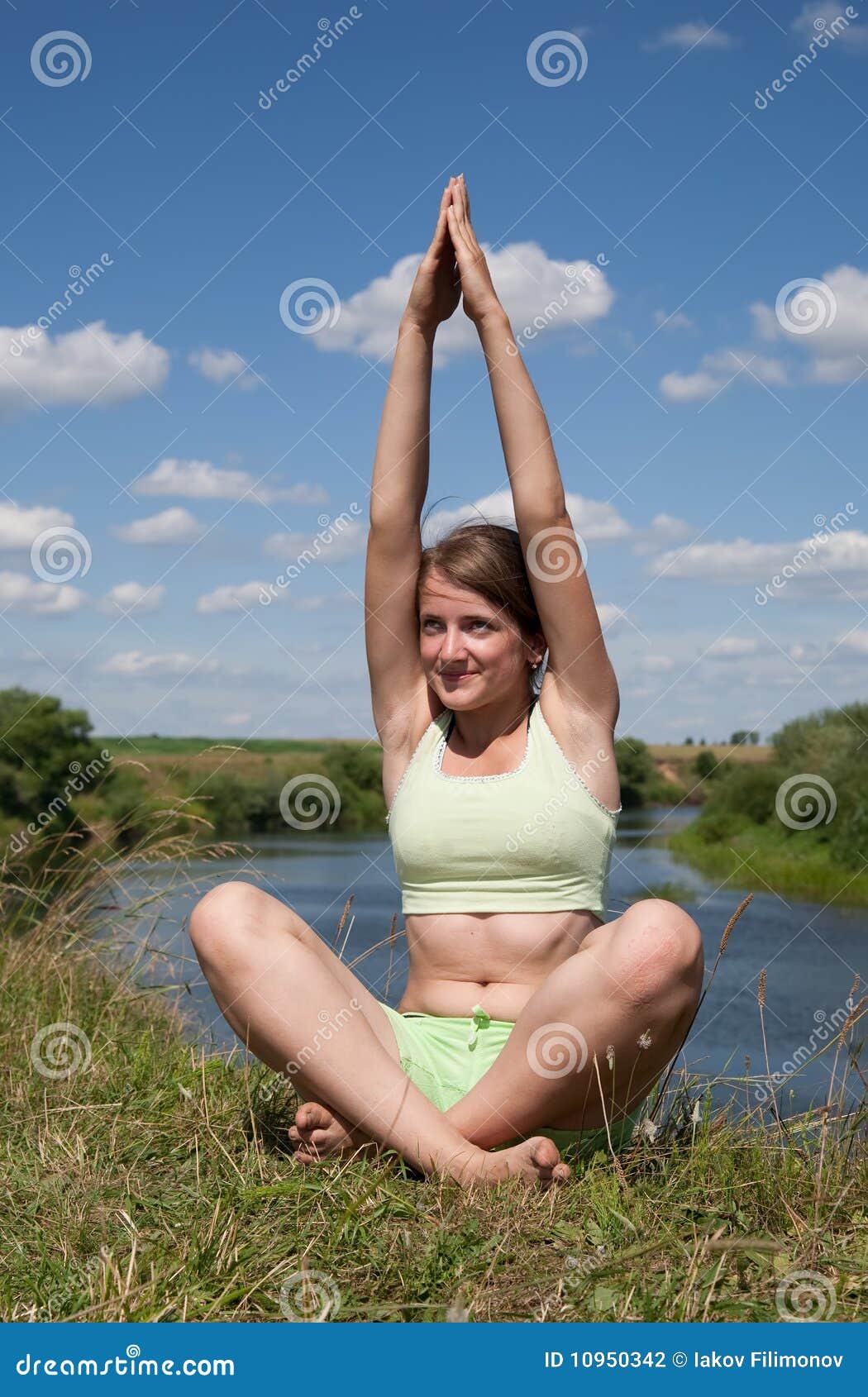 Young Girl Doing Yoga Against Na