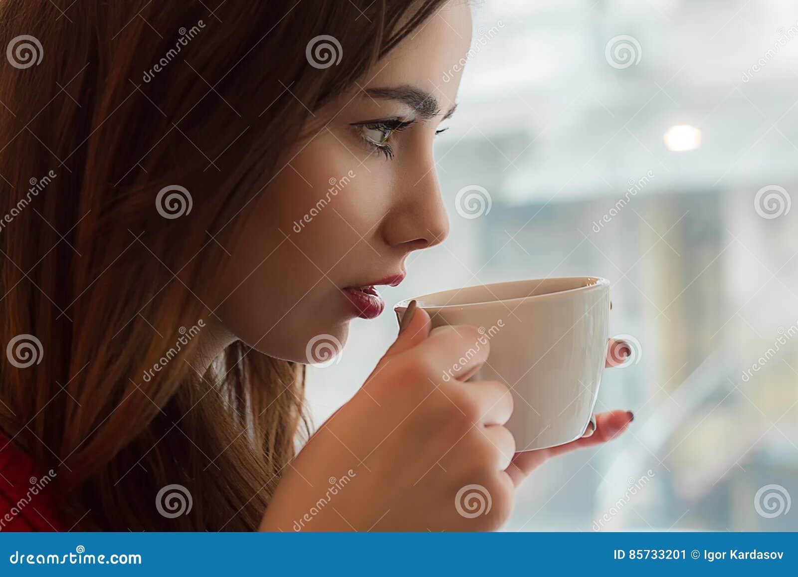 Young Girl Drinks Tea from Smal Cup in Cafe Stock Image Image of