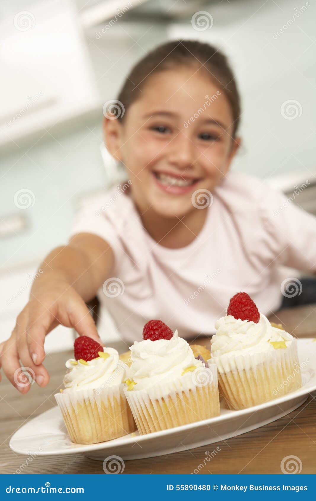 Young Girl Eating Cakes in Kitchen Stock Photo Image of indoors