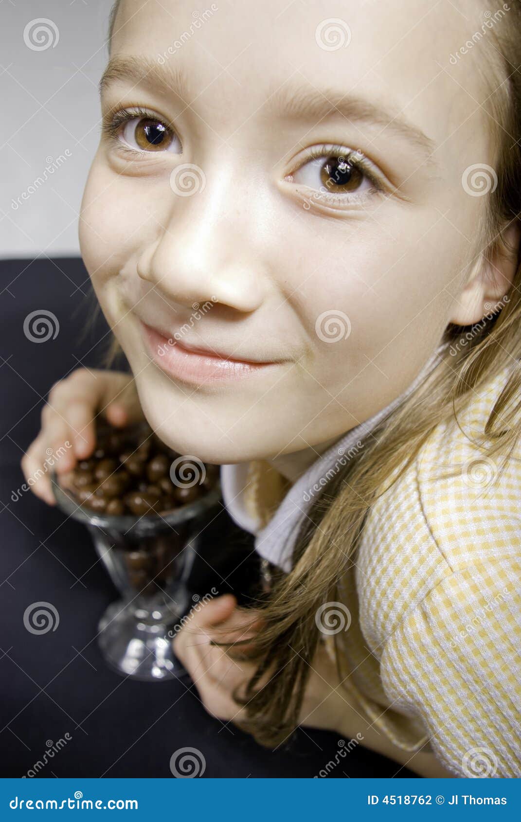 Young Girl Eating Candy stock photo. Image of food, candy 4518762