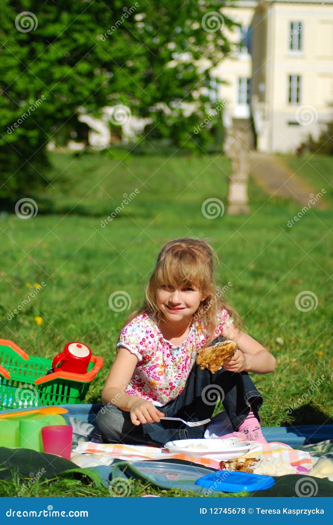 Young Girl Eating on Picnic Stock Photo Image of spring, plastic