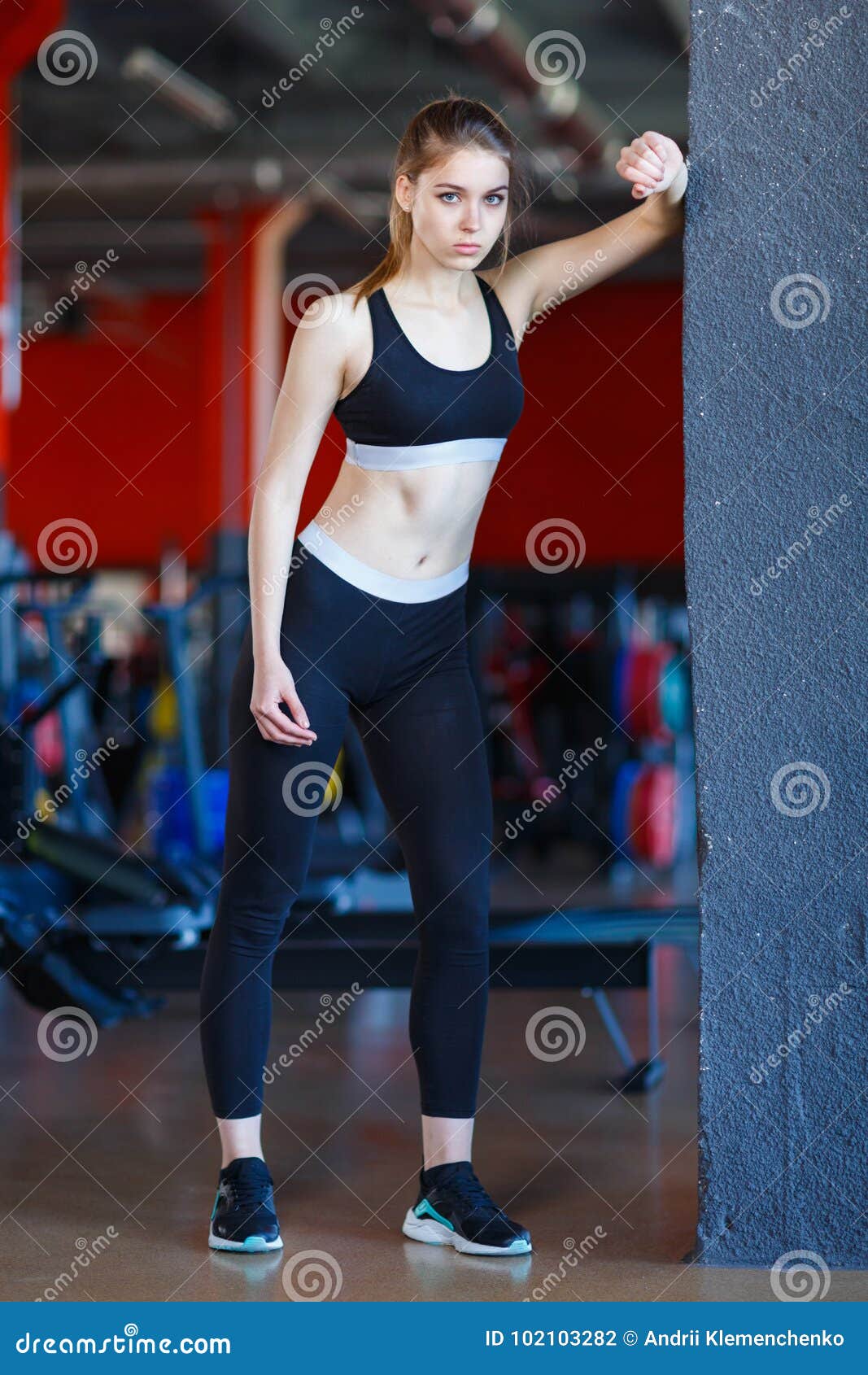 A Young Girl is Engaged in a Gym. Healthy Lifestyle. Stock Photo ...