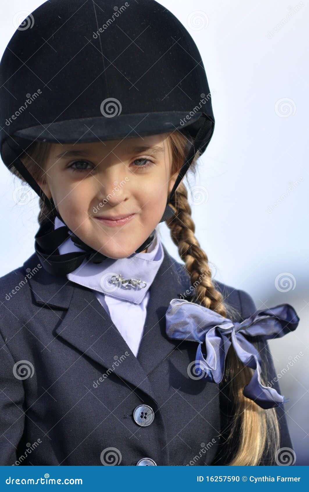 Young Girl in Equestrian Outfit Stock Photo Image of braided, safety