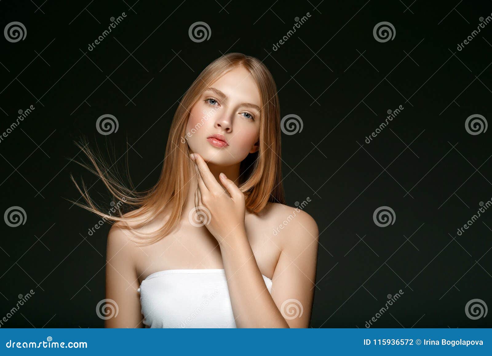 Young Girl Face Beauty Skin Portrait With Long Blonde Hair With