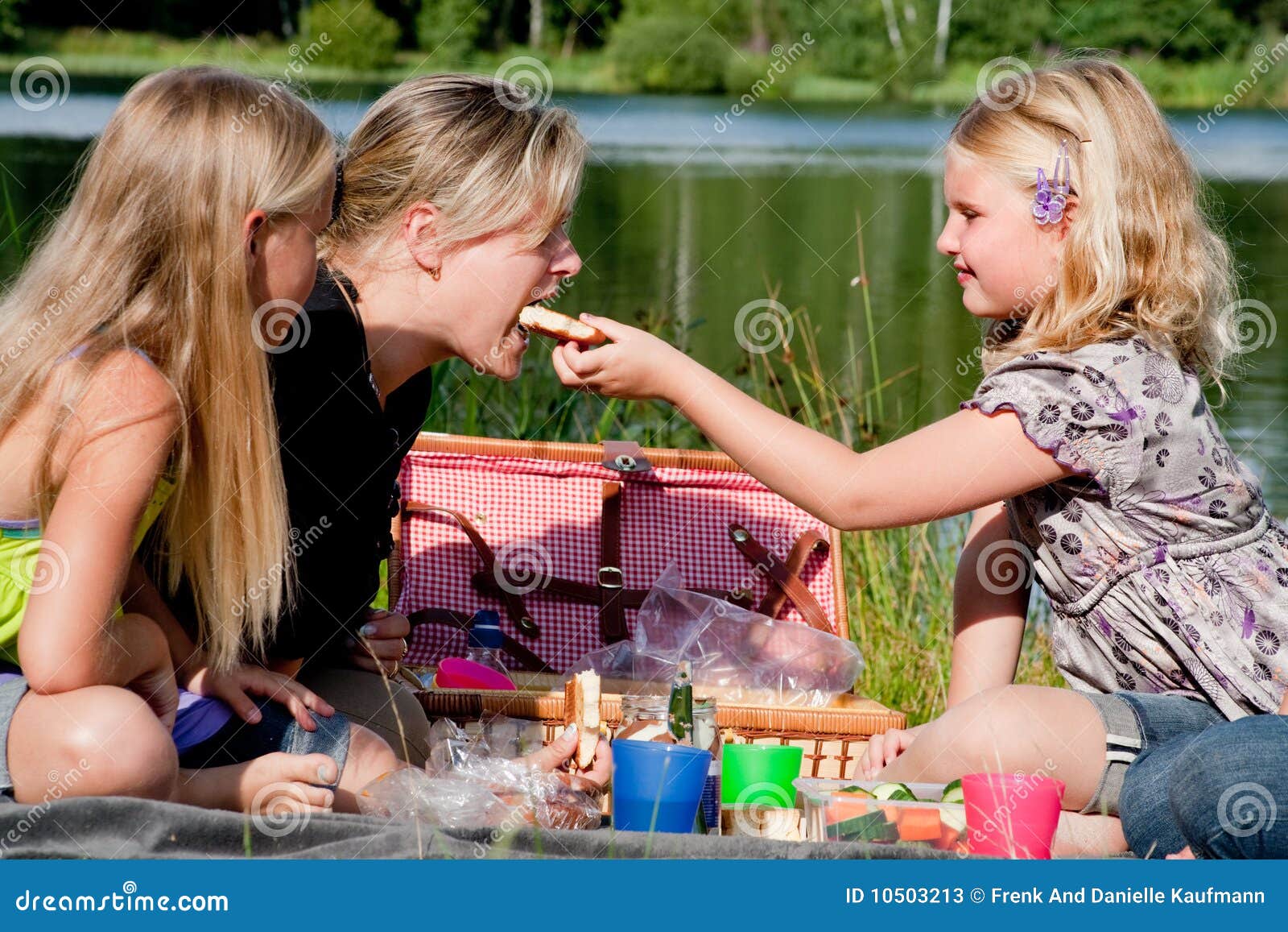 Young Girl Feeds Her Mother Stock Image Image Of Pleasure Eating 10503213 