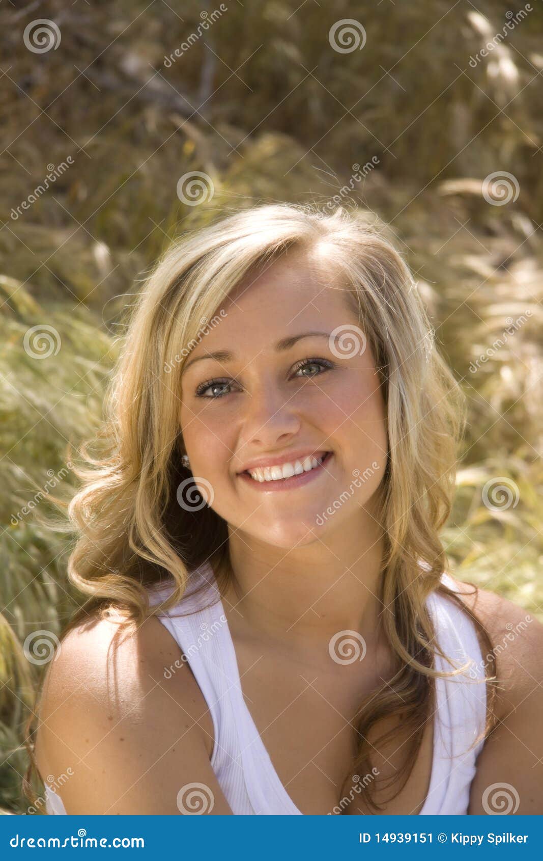 Young Girl in a Field stock image. Image of natural, blue - 14939151