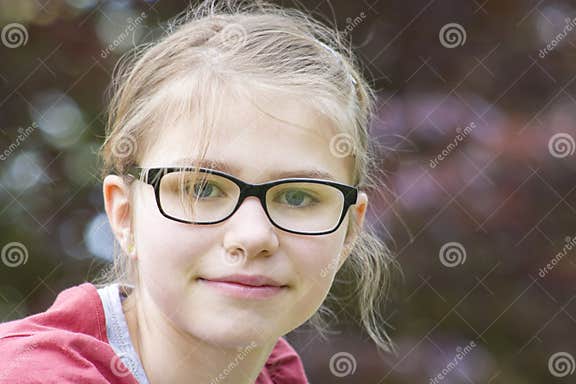 9. Young girl with glasses and dark blue hair - wide 8
