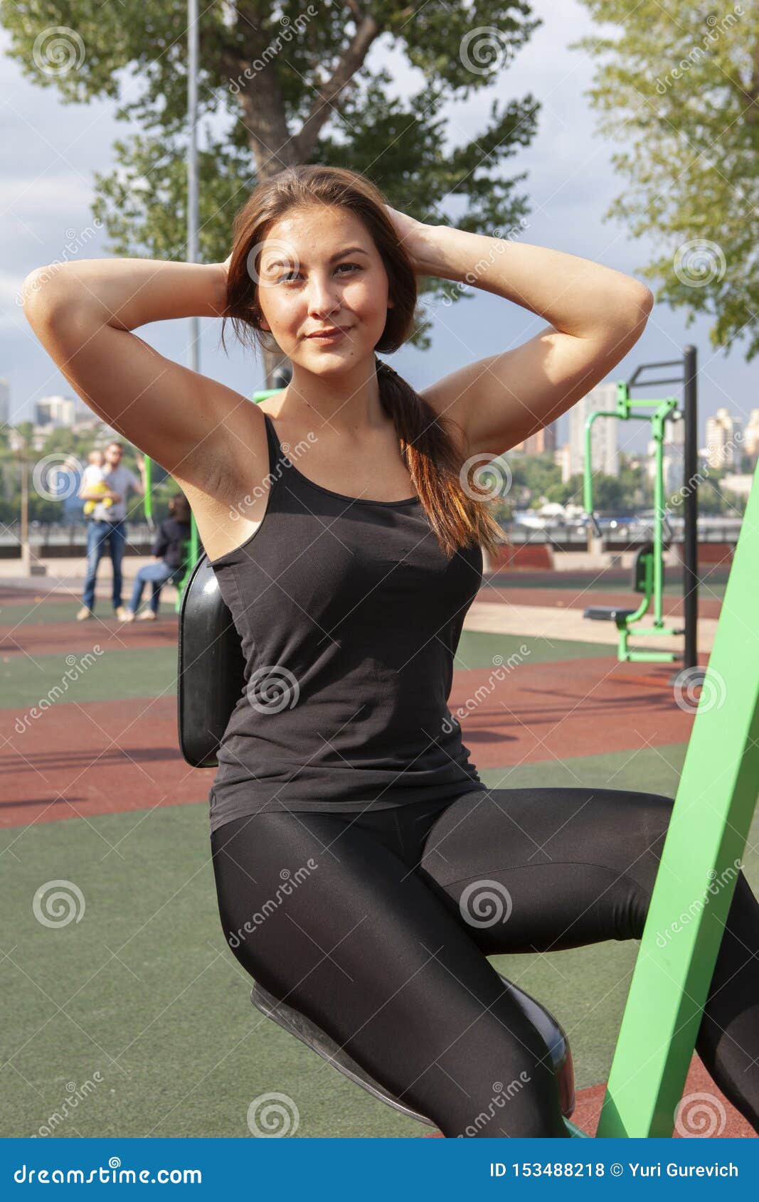 Young Girl Has the Training and Doing Exercise Outdoors on Street ...