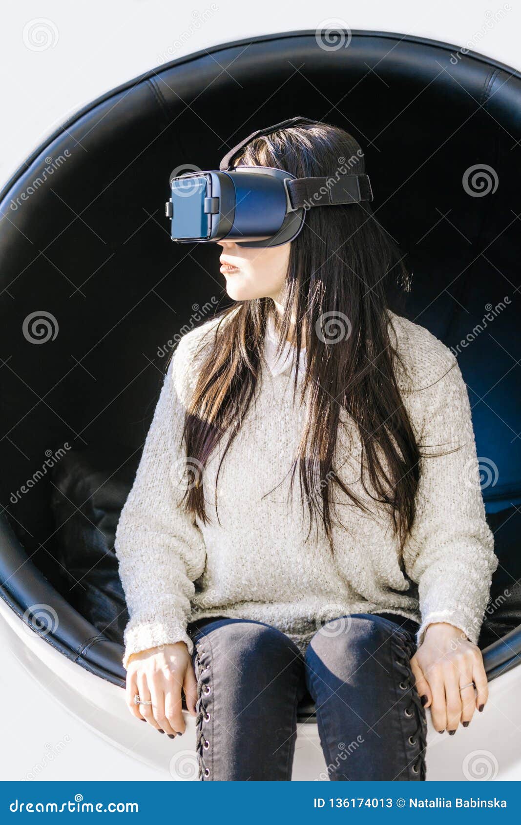 Young beautiful woman using vr playing vr-headset glasses 