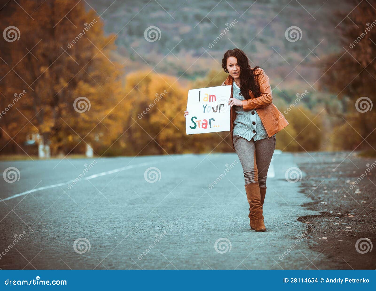 Young Girl Hitchhiking With Poster Stock Photo Image