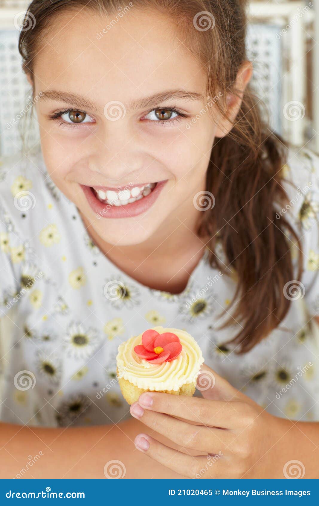 Young girl holding cupcake stock image. Image of caucasian 21020465