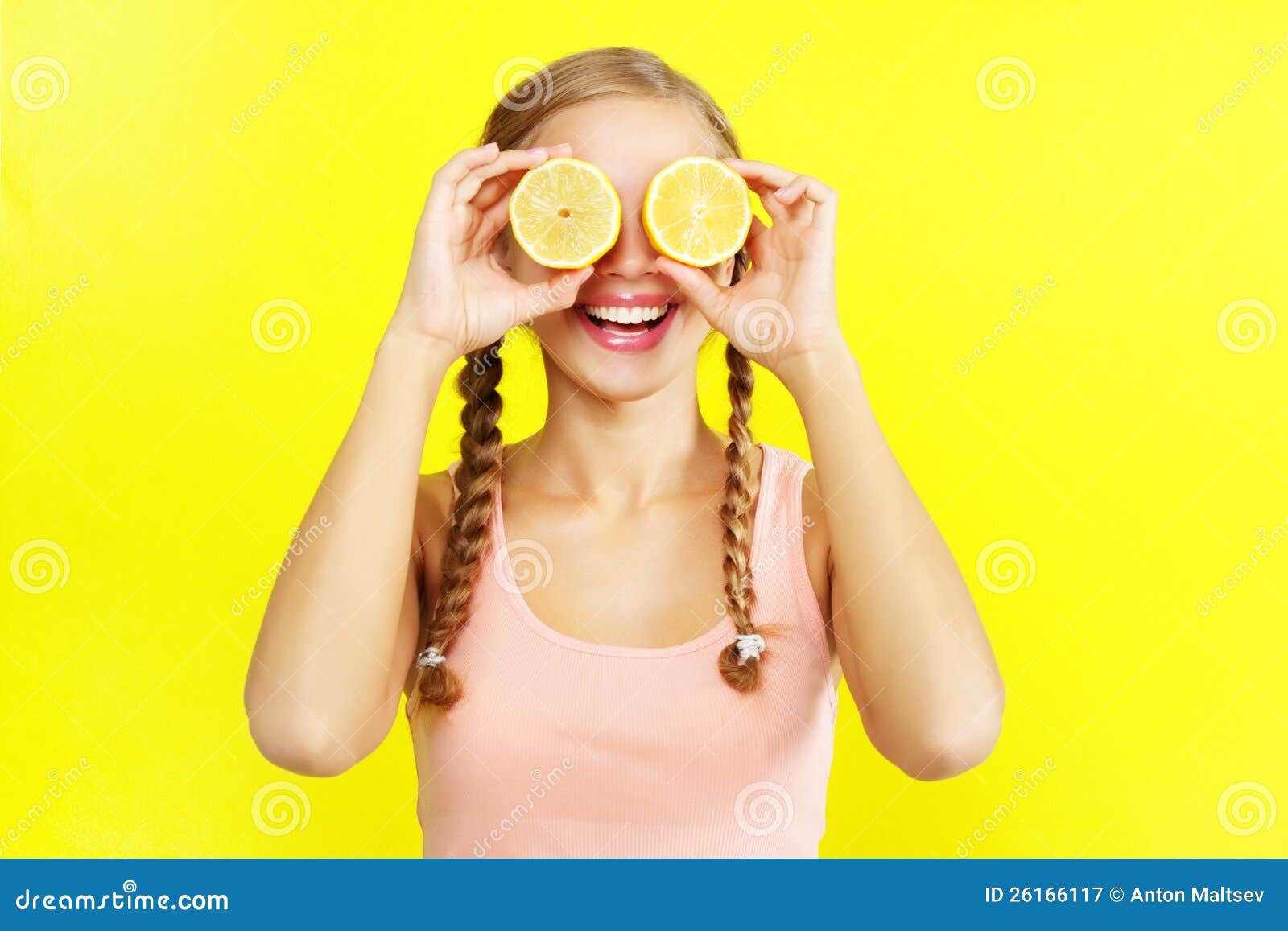 Young girl holding lemons stock image. Image of lemons 26166117