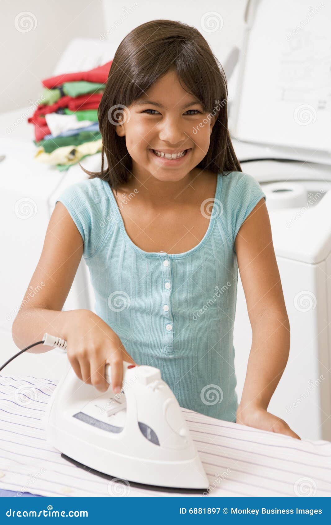 Young Girl Ironing stock image. Image of casual, laundry 6881897