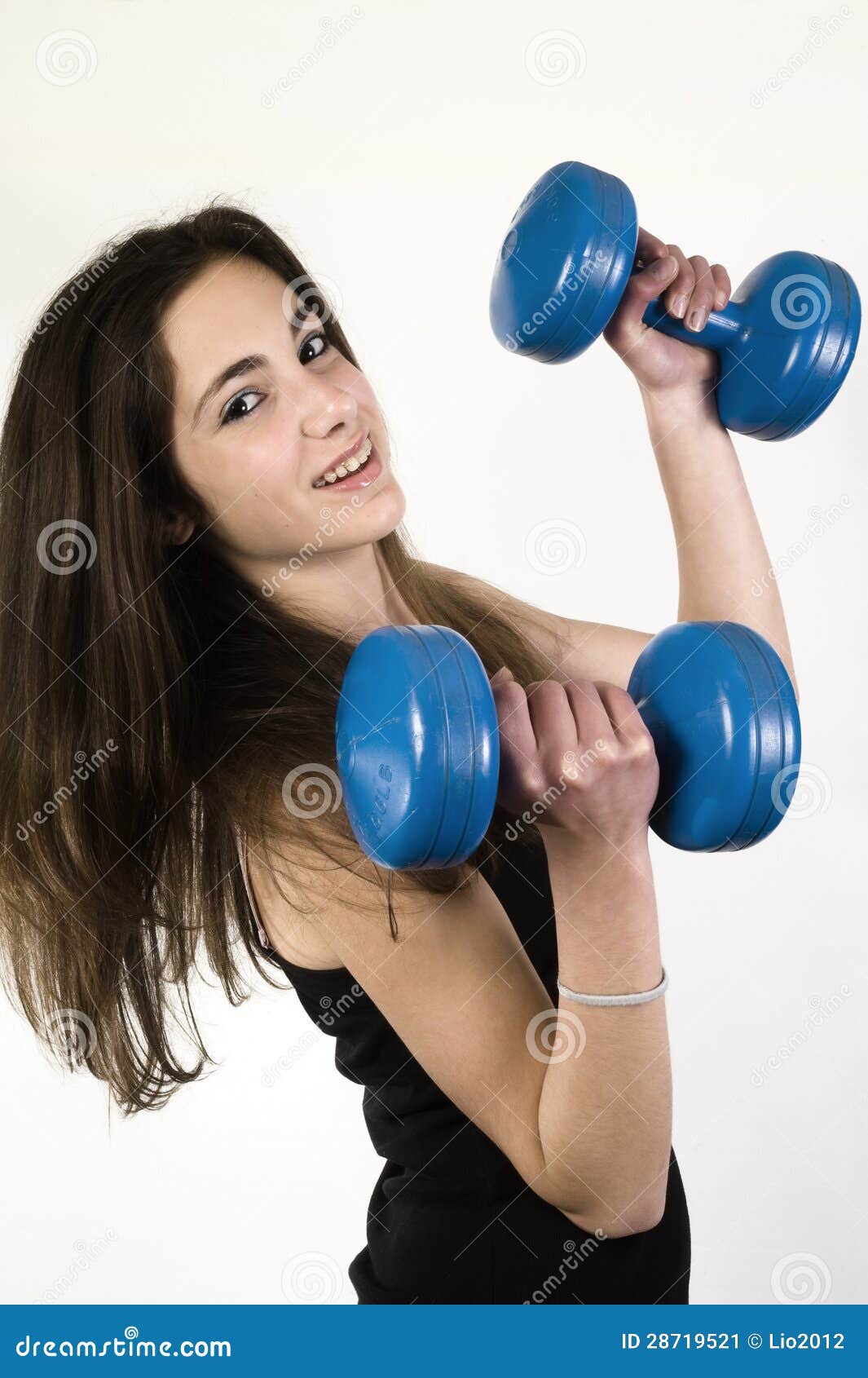 Young girl lifting weights stock image. Image of 28719521