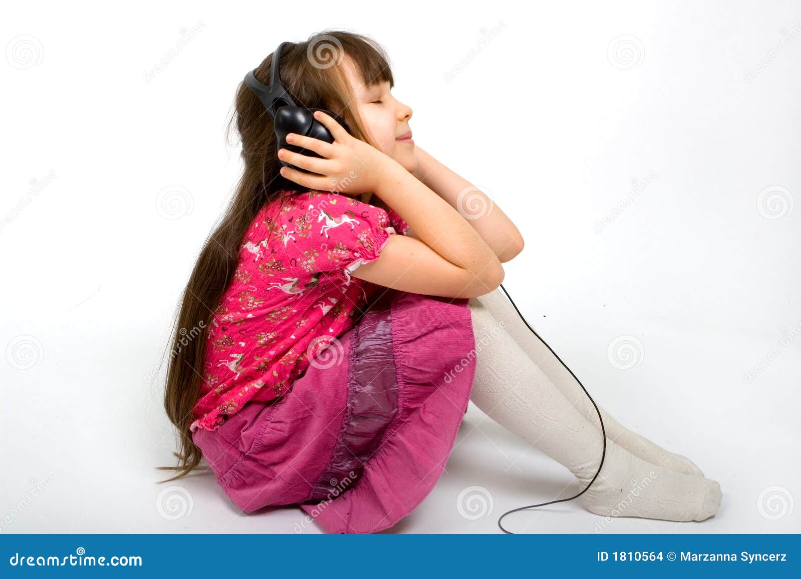 young girl listening to music