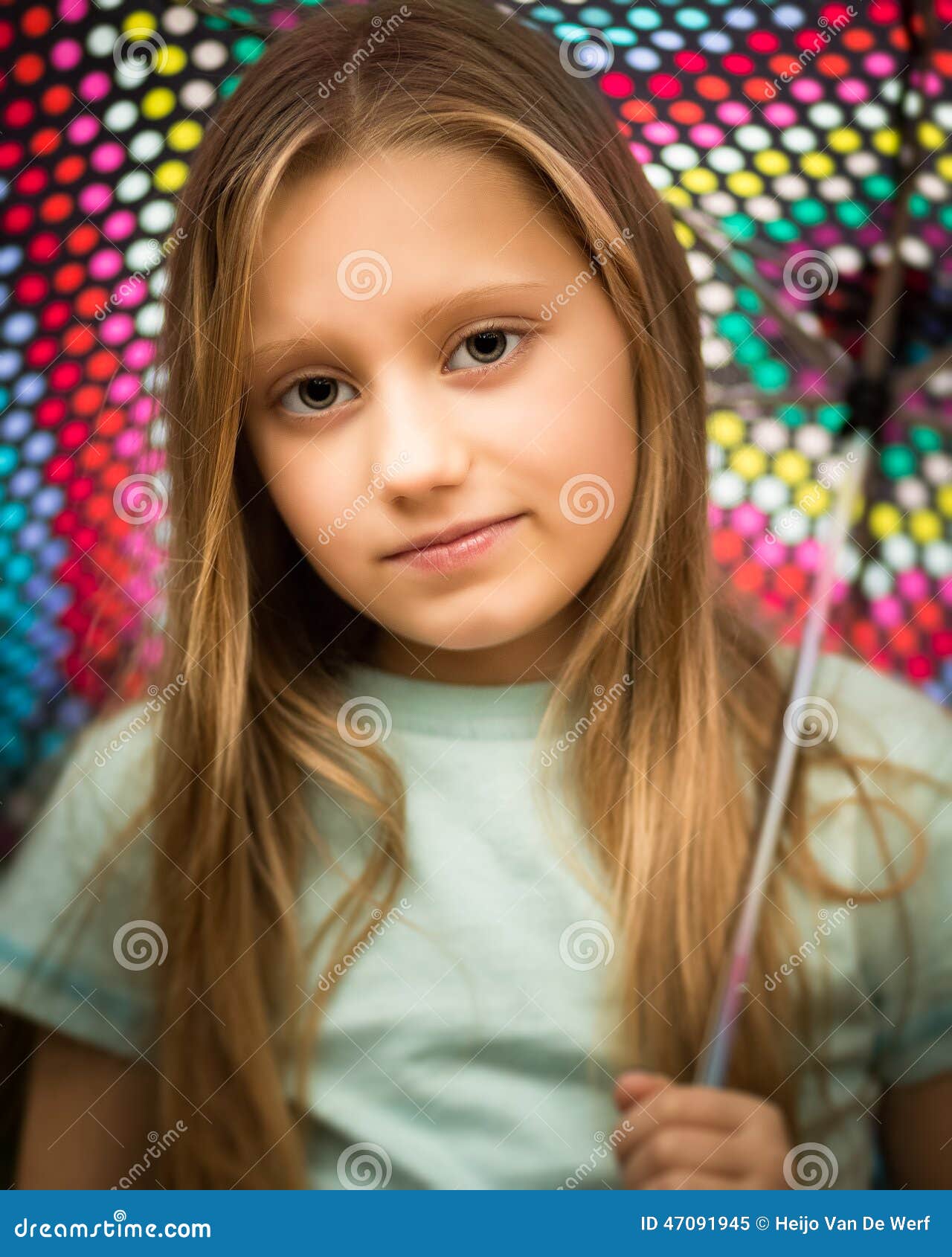 Young Girl With Long Hair Holding An Umbrella Stock