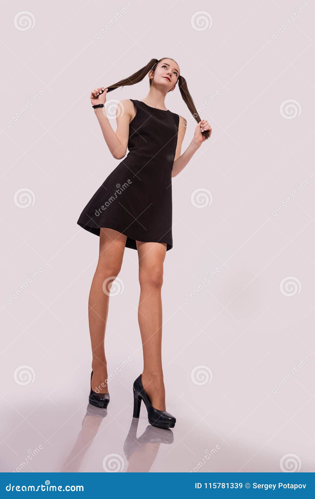 Young Girl with Long Hair in Short Dress on White Background. Stock ...