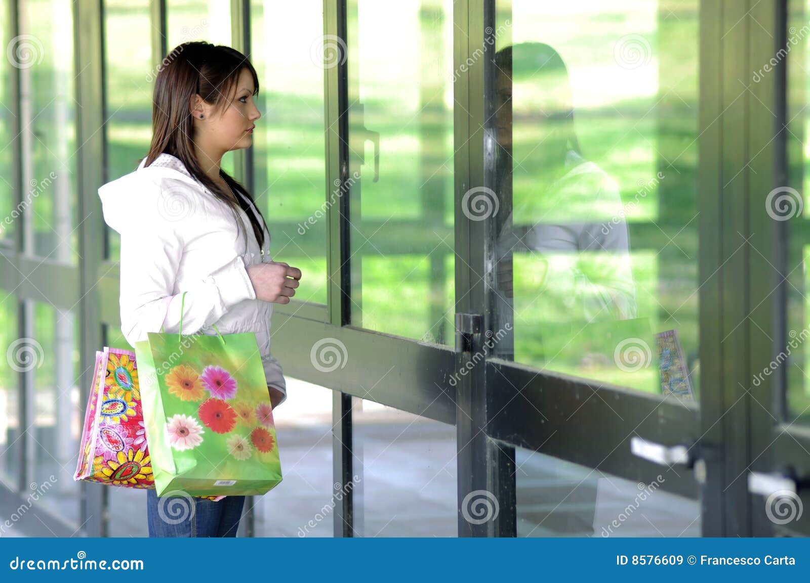 Young Girl Looking a Showcase Stock Image Image of spending, window