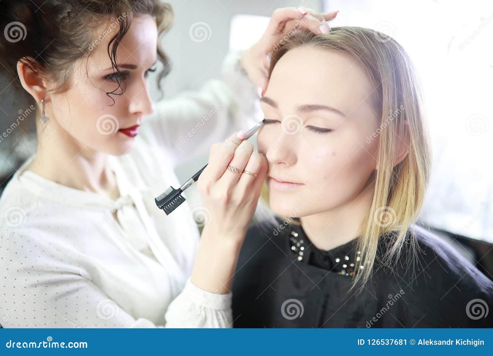 Young Girl with a Make-up Artist Stock Image - Image of fashion ...