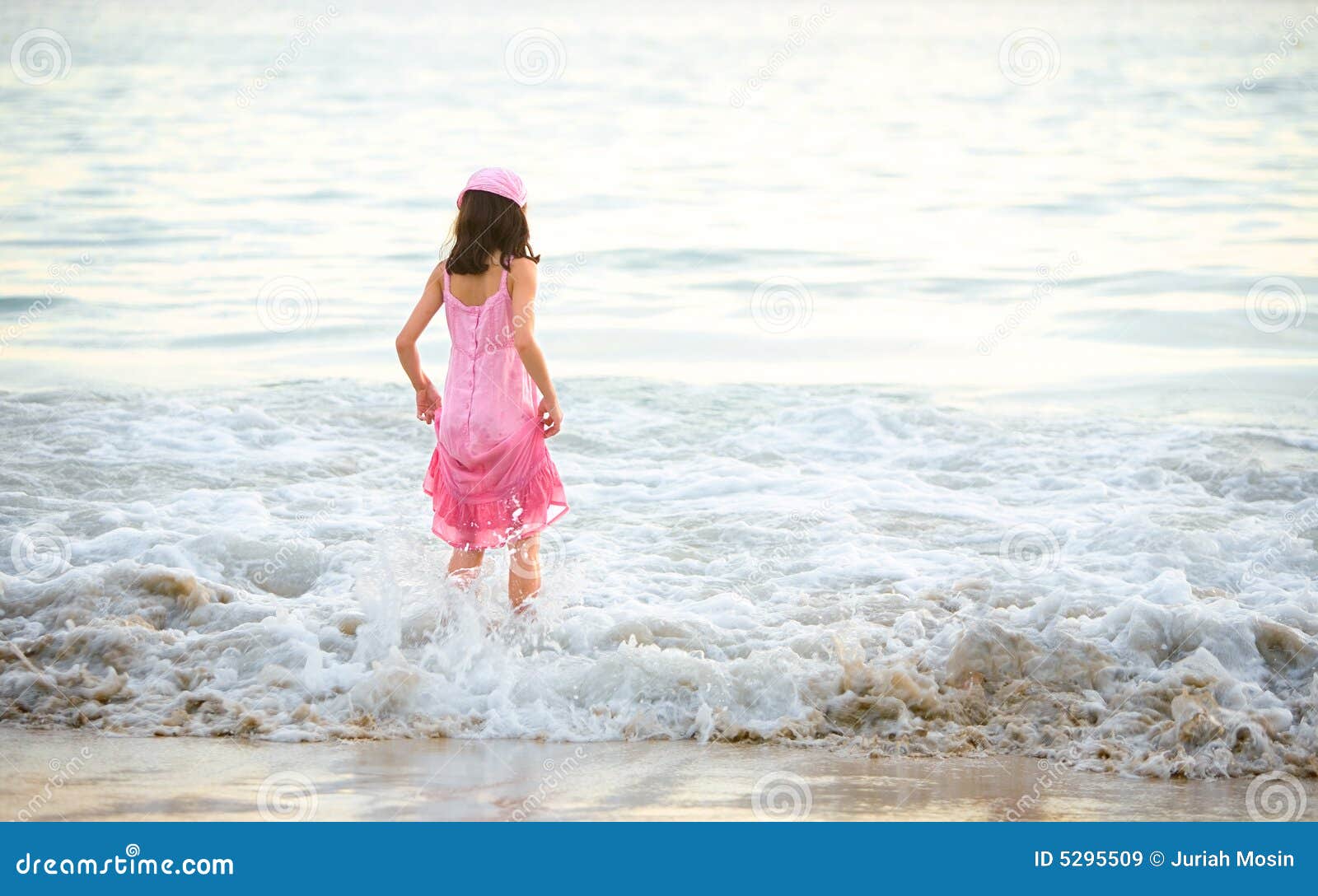 Young Girl in Pink Dress Enjoying the Waves Stock Image - Image of ...