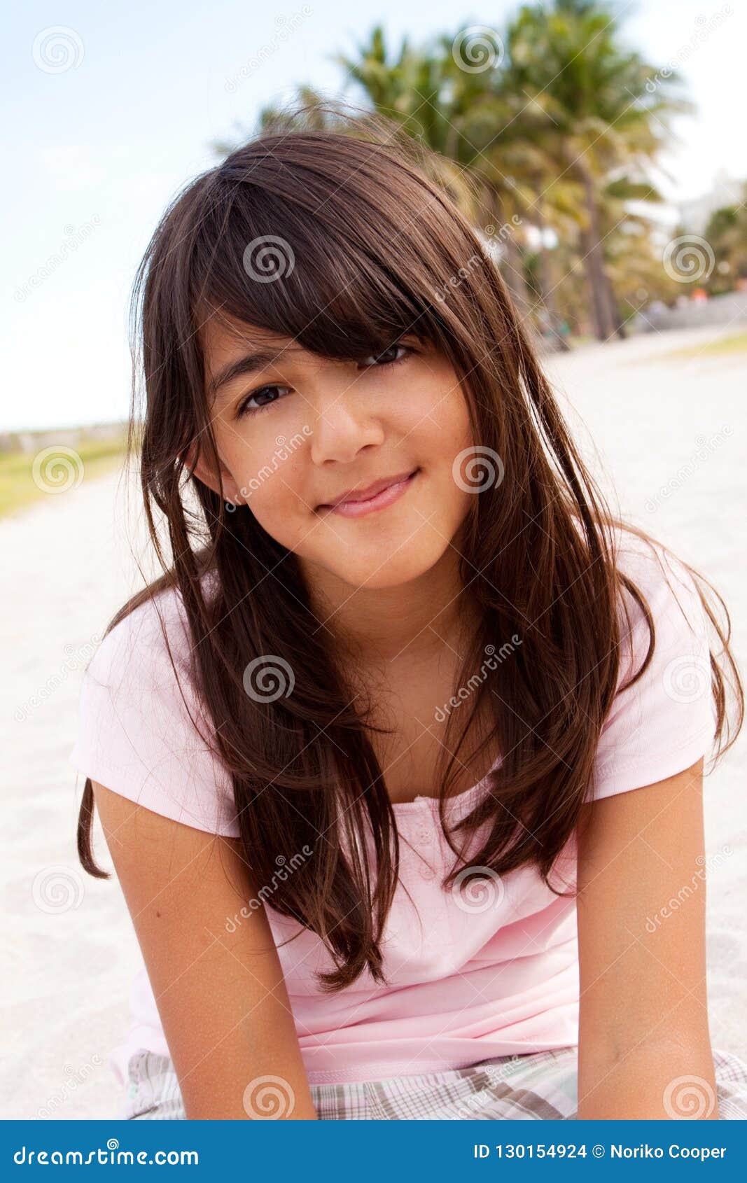 Young Girl Playing At The Beach On The Sand. Stock Photo ...