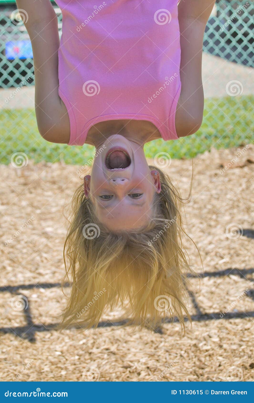 Young Girl Playing On Monkey Bars At The Park Stock Image - Image of