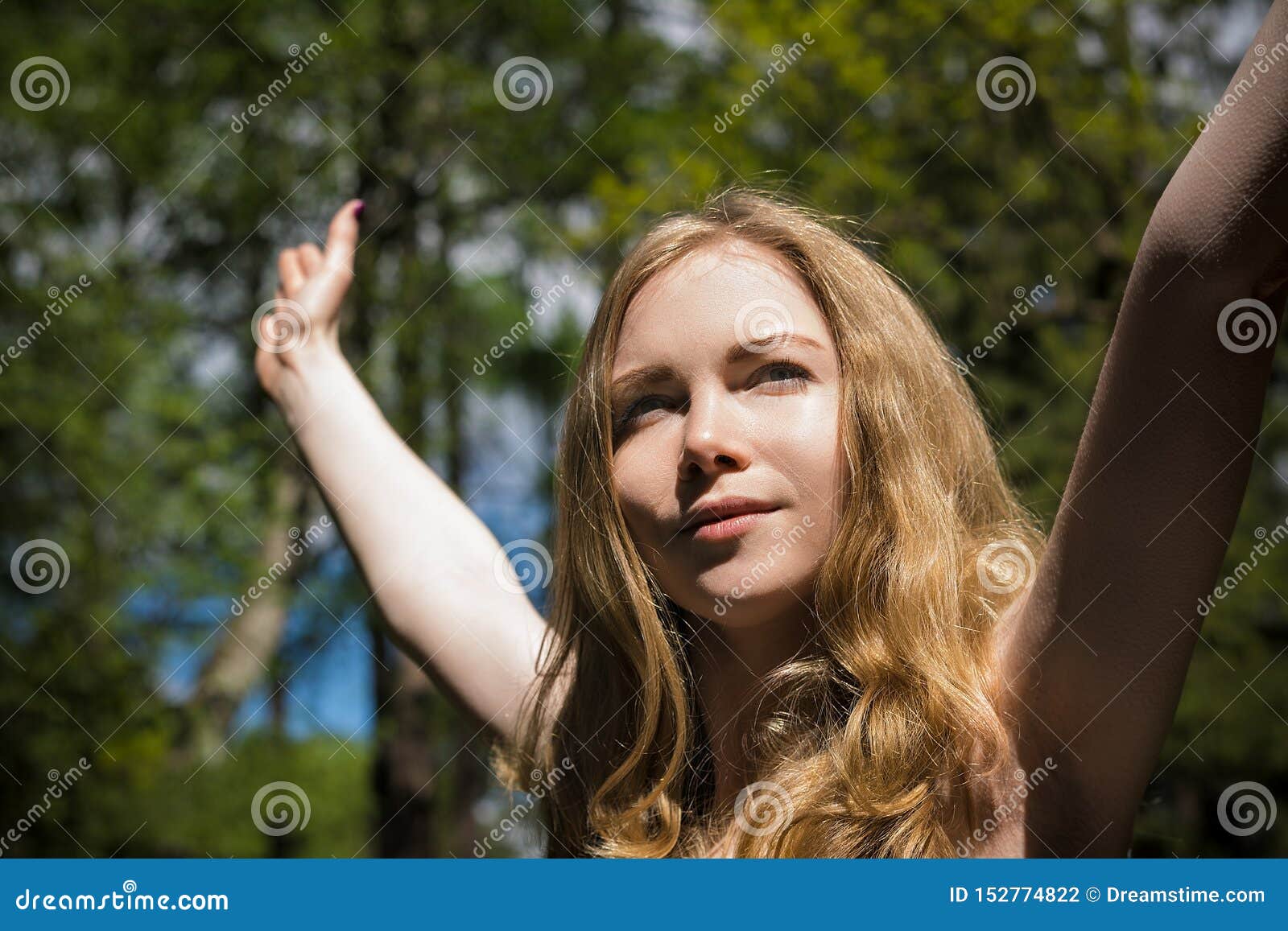 A Young Girl Raised Her Hands Up Stock Photo Image Of Cheerful