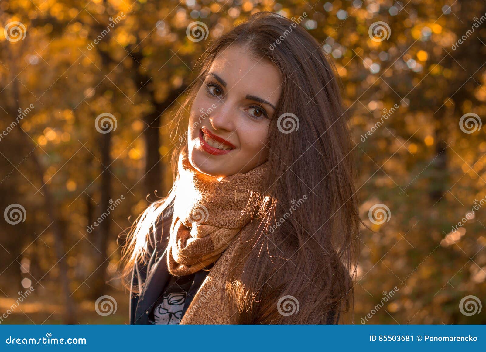 Young Girl with Red Lips Stands in the Park and Smiles Stock Image ...
