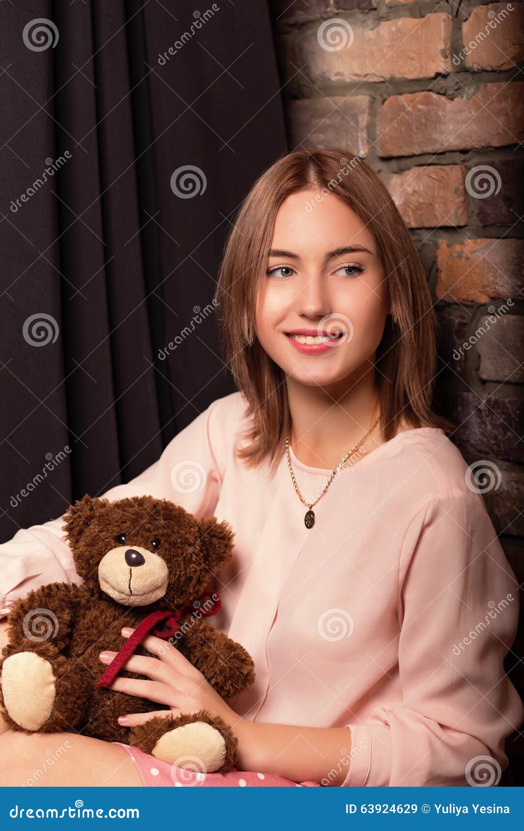 Young Girl in a Rose Dress with Bear Toy. Studio Photo Stock Image ...