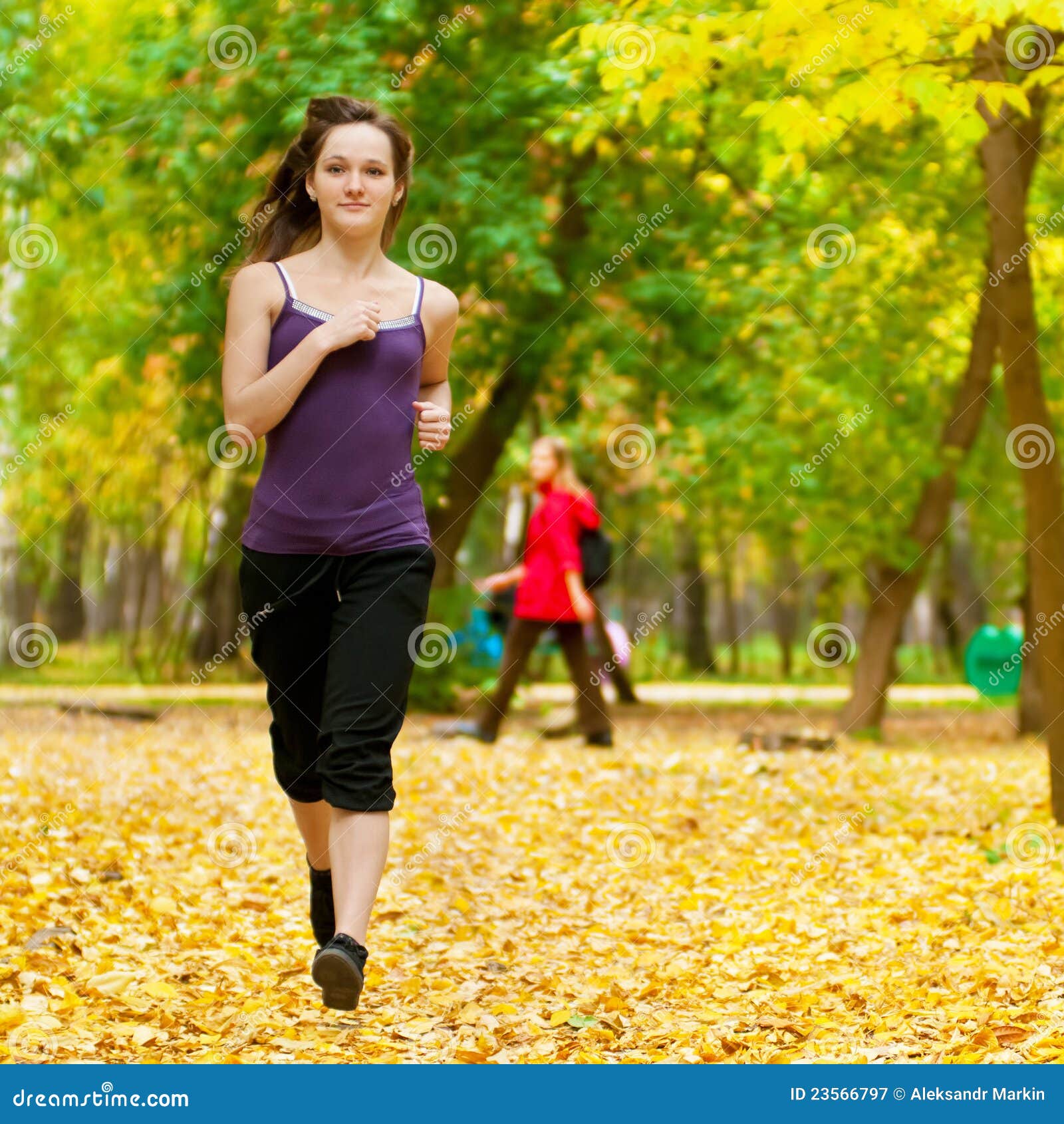 A Young Girl Running in Autumn Park Stock Image - Image of motion ...