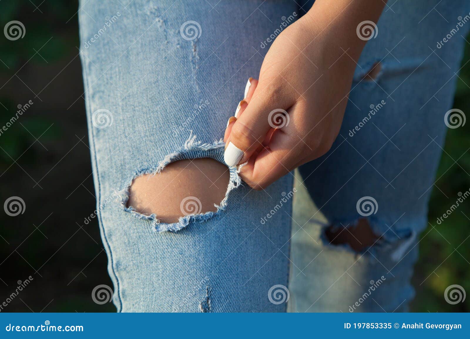 Young Girl`s Legs in Blue Torn Jeans Stock Image - Image of legs, torn ...