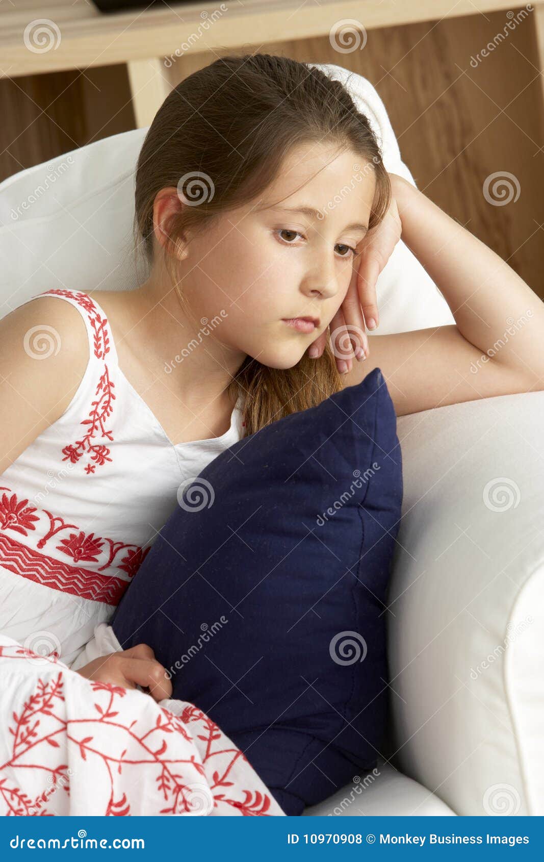 Young Girl Sat on Sofa at Home Stock Photo - Image of lonely, colour ...