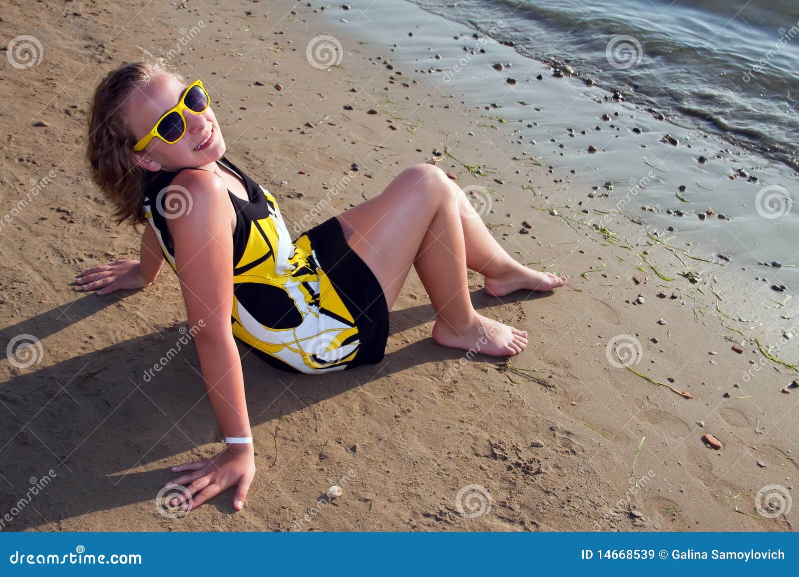 Young Girl Sitting on the Beach Stock Image Image of sitting hand