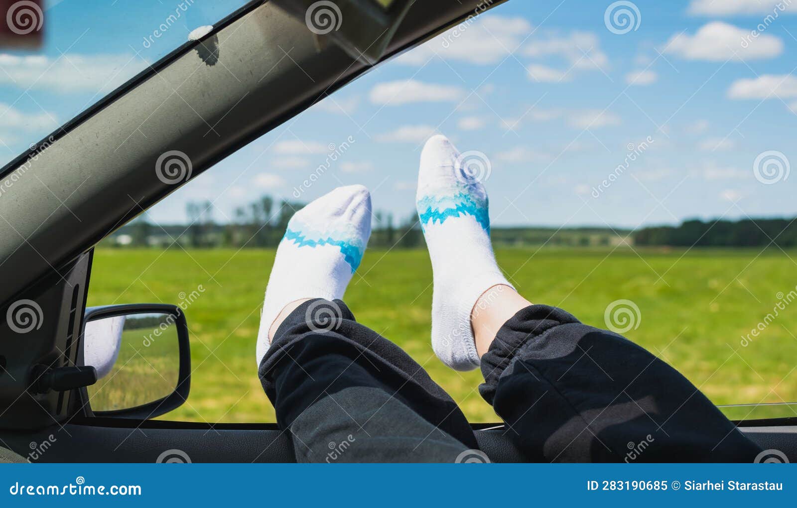 A Young Girl Stuck Her Legs Out of the Car Window Stock Image Image
