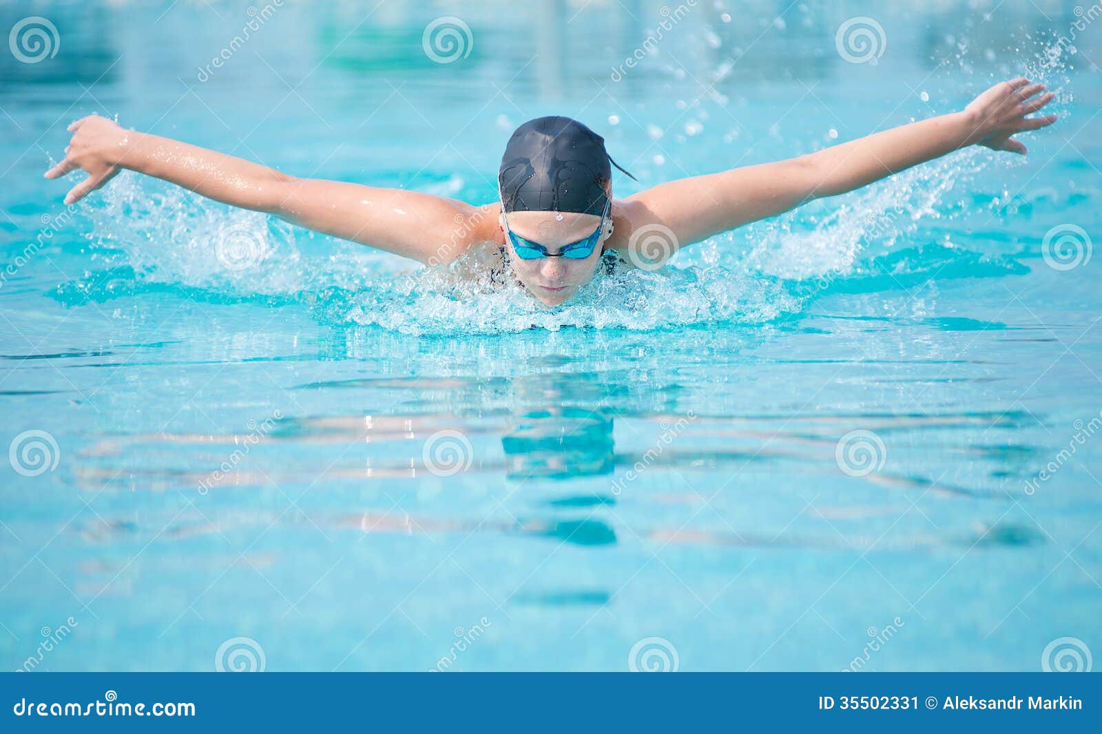 Young Girl Swimming Butterfly Stroke Style Stock Image - Image of ...