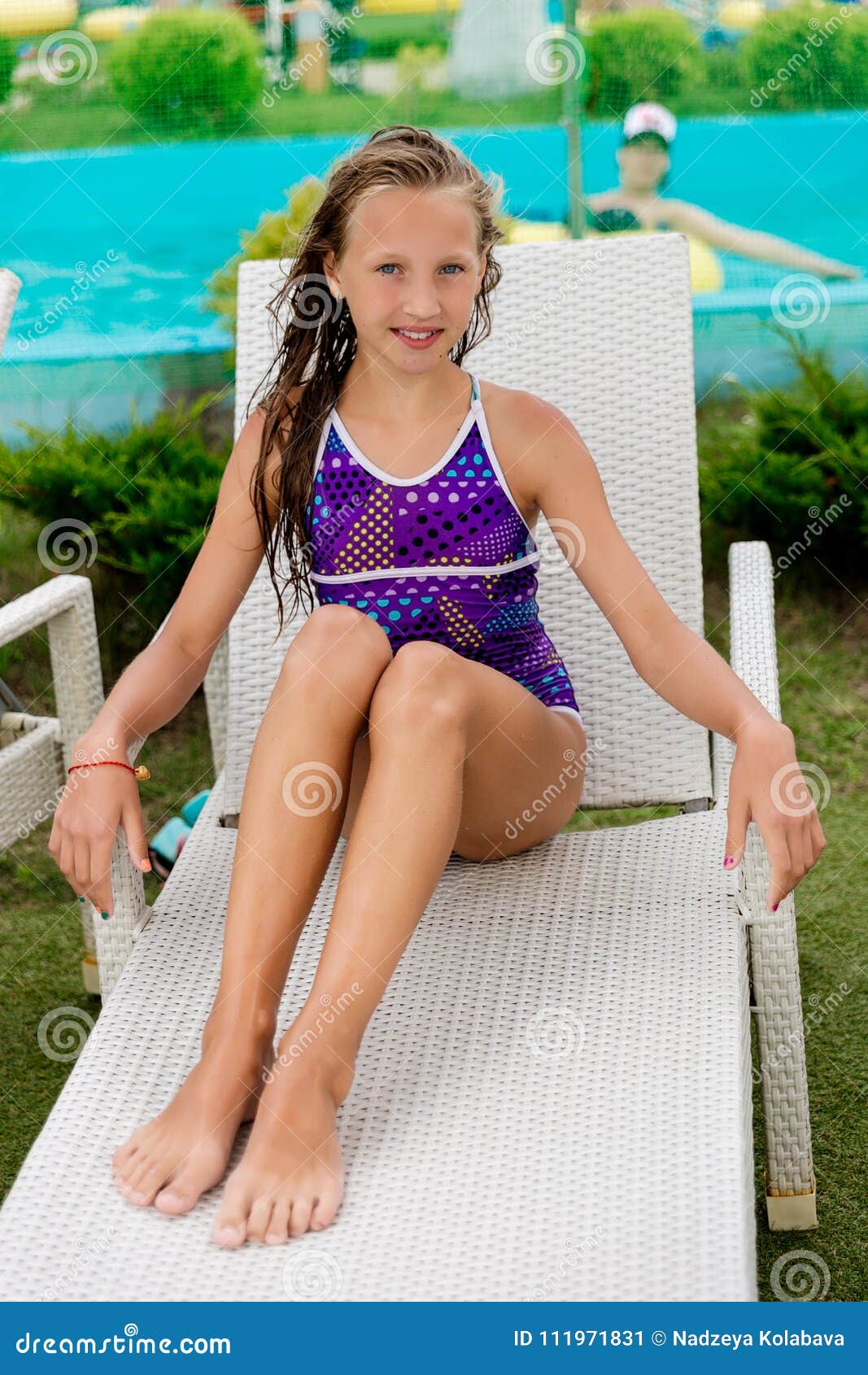 Young Girl in a Swimsuit on a Shelf by the Pool Stock Image - Image of  dive, beautiful: 111971831