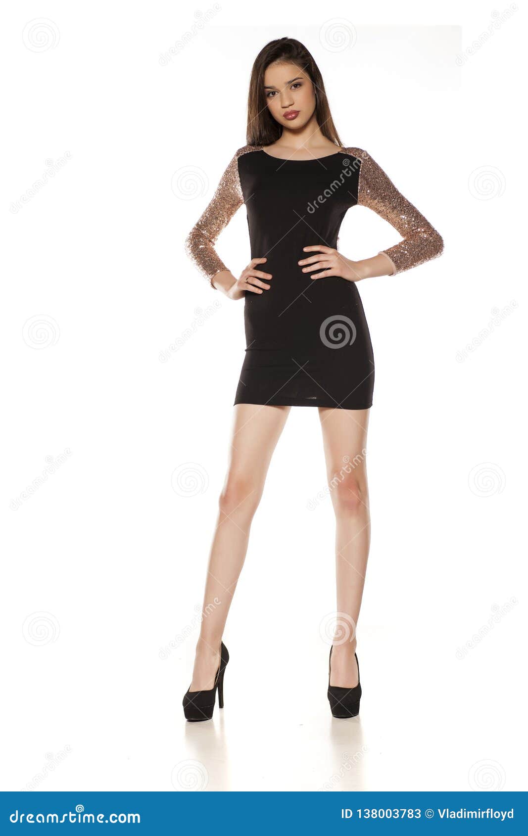Happy Young Girl Tight Black Dress High Heels Posing White Stock Photo by  ©VGeorgiev 241333012