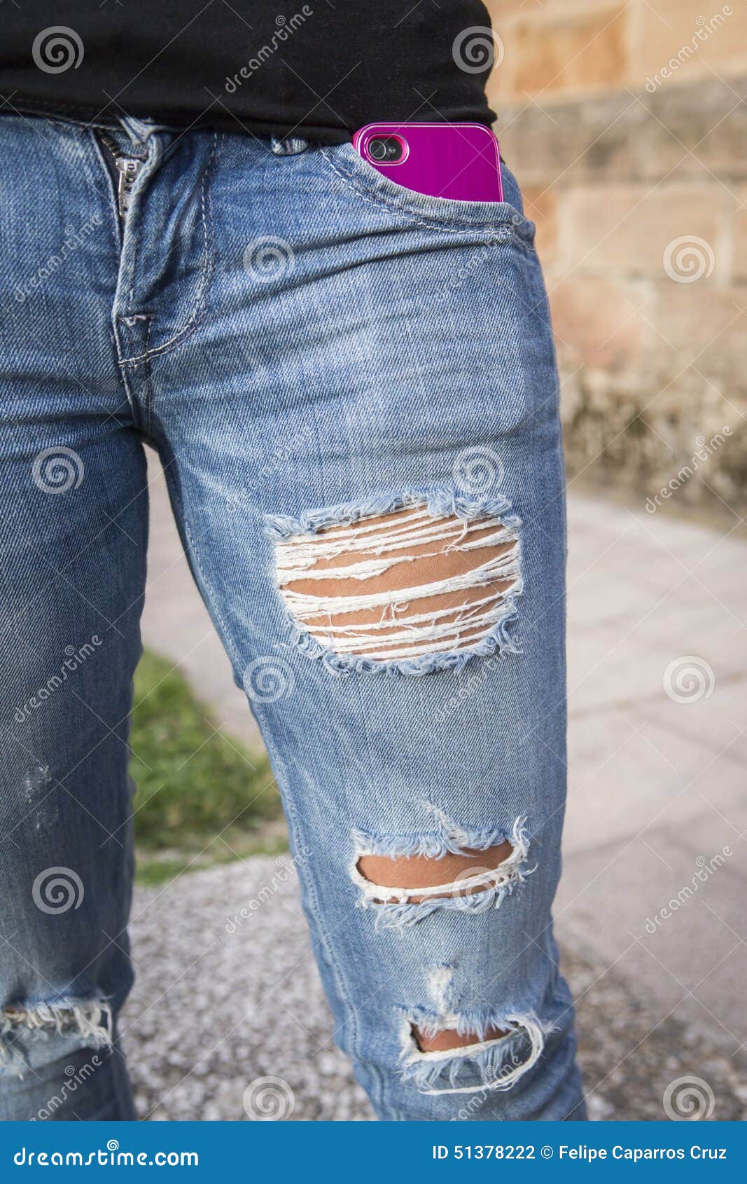 Young Girl in the Torn Jeans Stock Photo - Image of fingernail, finger ...