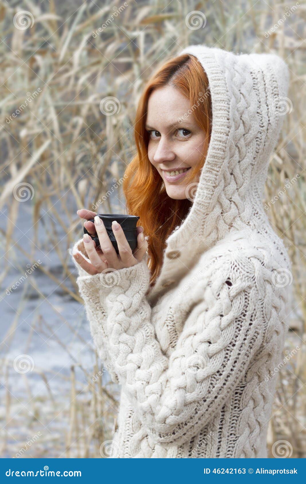 Young Girl in Warm Sweater Drinking a Cup of Hot Drink Stock Image ...