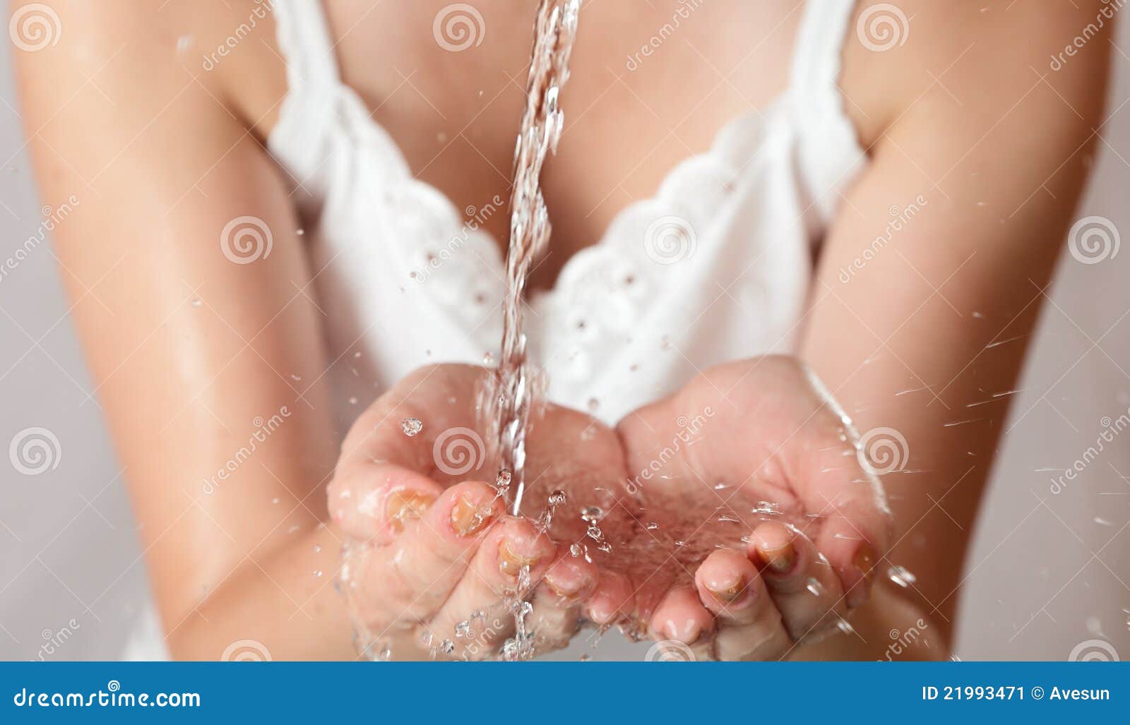 young girl washes with clean water