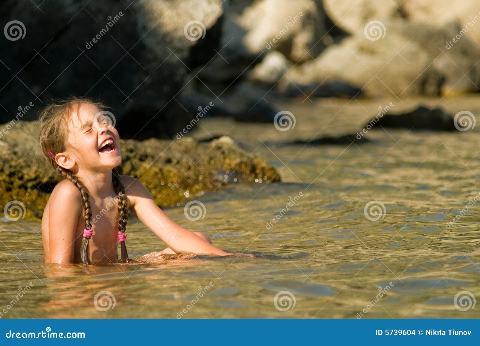 Young Girl in Water Laughing Stock Photo - Image of child, white: 5739604