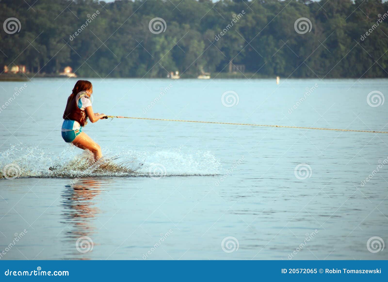 Young girl water skiing stock image. Image of splashing 20572065