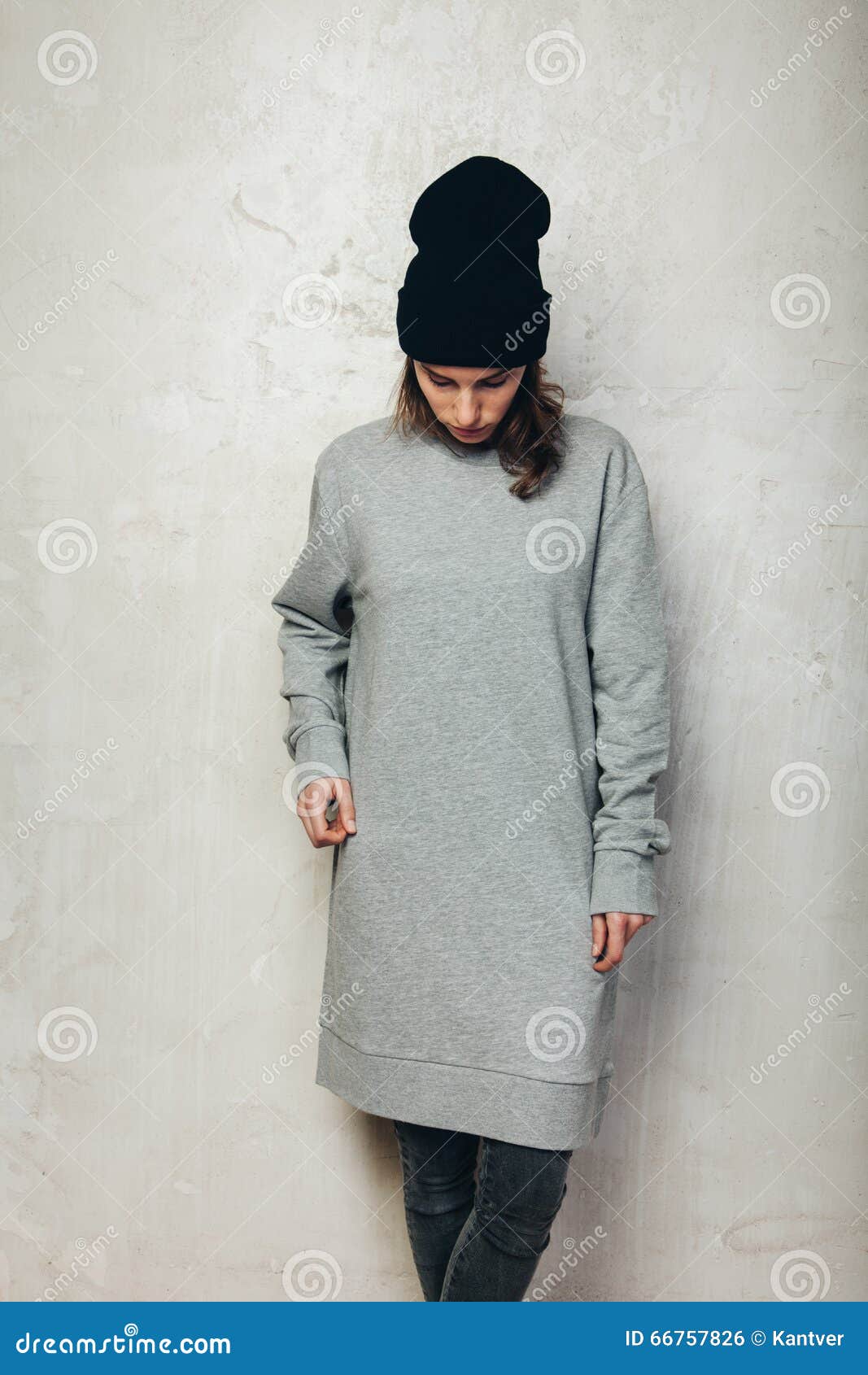 Young Girl Wearing Blank and Oversize Long Hoody. Concrete Wall ...