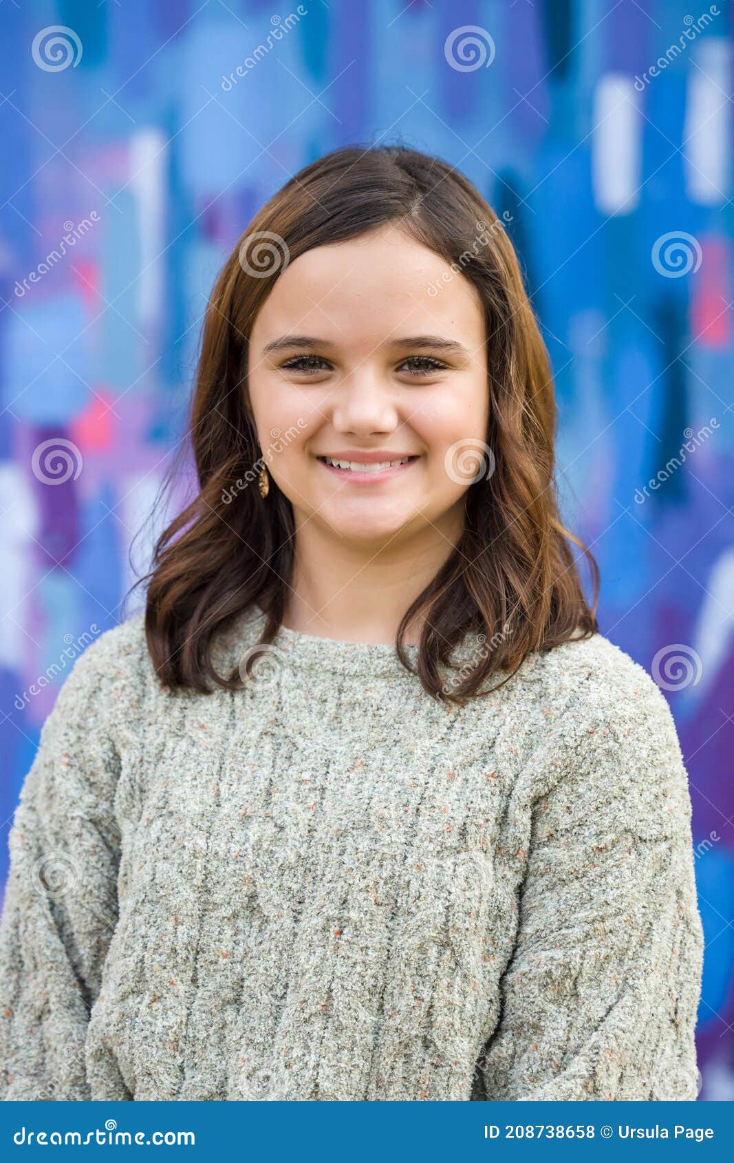 Young Girl Wearing a Sweater in the Winter Standing Outside Near a ...